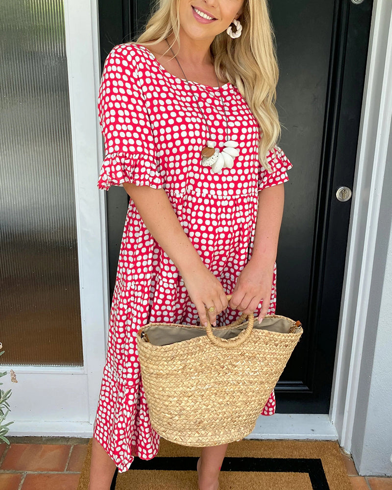 Polka Dot Midi Dress with a Round Neckline