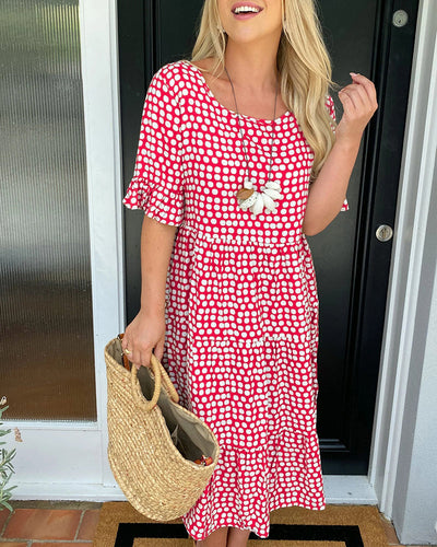 Polka Dot Midi Dress with a Round Neckline