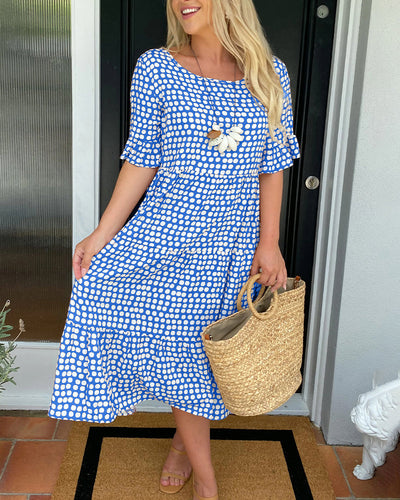 Polka Dot Midi Dress with a Round Neckline