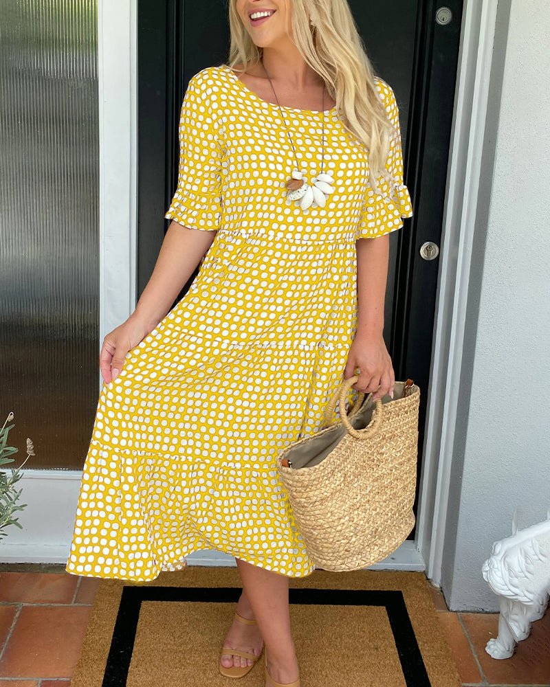 Polka Dot Midi Dress with a Round Neckline