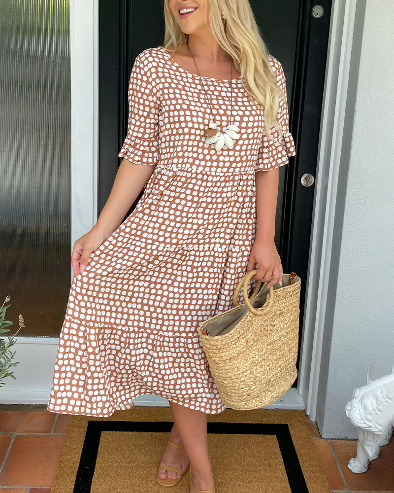 Polka Dot Midi Dress with a Round Neckline